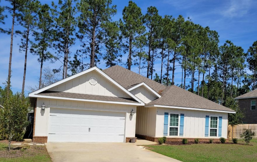 Just 25 minutes from the white sandy beaches of 30A, Hammock Bay is the premier development in Freeport. Amenities include modern swimming pools, clubhouse, gym, numerous tennis, pickleball, and basketball courts, dog parks, fishing ponds, frisbee golf course, onsite security, miles of walking trails, and a grocery 'General Store.' Farmer's market, food trucks, and special events weekly, with new food and entertainment venues under construction! This spacious 4 bedroom home is steps away from a scenic walking path along one of many landscaped ponds. The open living area / kitchen floorplan leads to the screened back patio, private backyard, garden, and roomy side yards on both sides of the home. Freeport public schools have bus stops steps away from home!