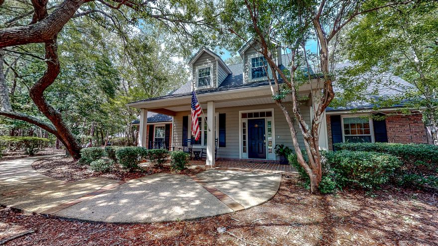 Southern charm and gracious living describe this one-owner custom home located on an estate sized lot in Bluewater Bay. A front porch made for using welcomes you on entering. Spacious rooms and well defined, thoughtful spaces make way for truly comfortable living and entertaining. Plenty of room for gathering or quieting away inside or out. The impeccably maintained home has been tastefully updated throughout the years. The pool side master suite and additional bedroom and full bath are located on first level. You'll find a loft, three bedrooms, full bath and large storage room on the second level.  Sister/brother bedrooms share a common main entrance and large walk-in closet. A spacious sunny utility room for organizing, laundry, storage is accessible from kitchen and garage.  please see