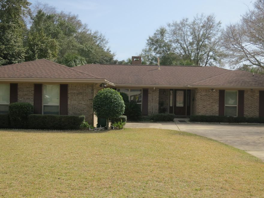 This is a wonderfully updated 4 bedroom home in the beautiful Poquito/Longwood area with a gunite pool. The fabulous remodeled kitchen was designed by Linn's Prestige Kitchens (08) & is perfect for entertaining with an island with a gas cooktop and a bar. Travertine floors in the kitchen and living areas complete the look. The floor plan has split bedrooms, a double sided fireplace between the family and dining areas, and a wonderful large sunroom accessed with 2 sets of double french doors. The 20X40 pool is surrounded by a spacious flagstone patio and a removable custom fence to keep children safe. This home is conveniently located near Eglin & Hurlburt AFB. A bayou front park is just down the road for the kids to play. Come see this fabulous home today! Buyer to verify all dimensions.