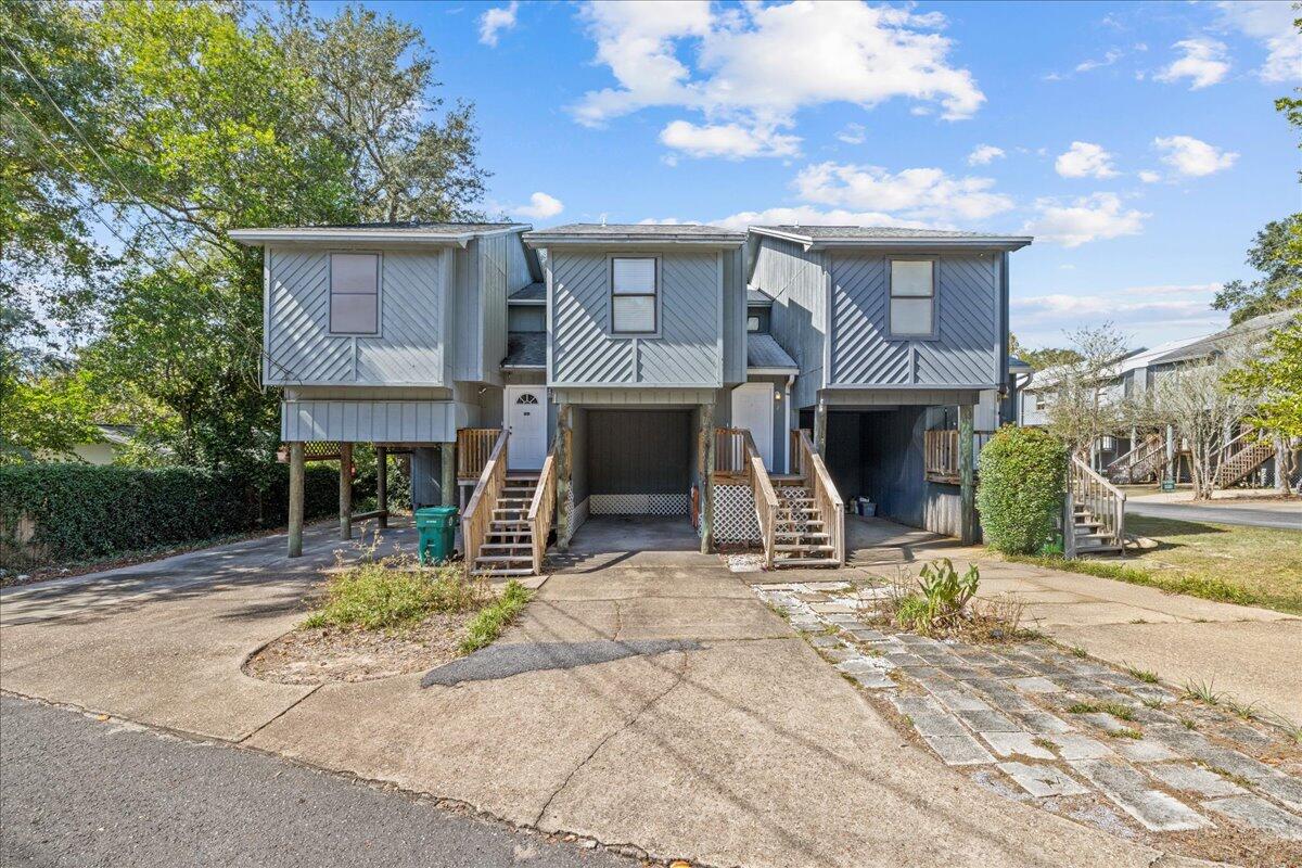 Welcome to the Bayou! This charming townhome offers two spacious bedrooms, two full bathrooms, and an open living-dining space that provides an ideal floor plan for both investors and full-time residents. Covered patio off of the first floor bedroom and covered carport area. Brand New Roof, HVAC, and water heater for peace of mind and easy insurance coverage! HOA also includes private waterfront gazebo for residents to use.