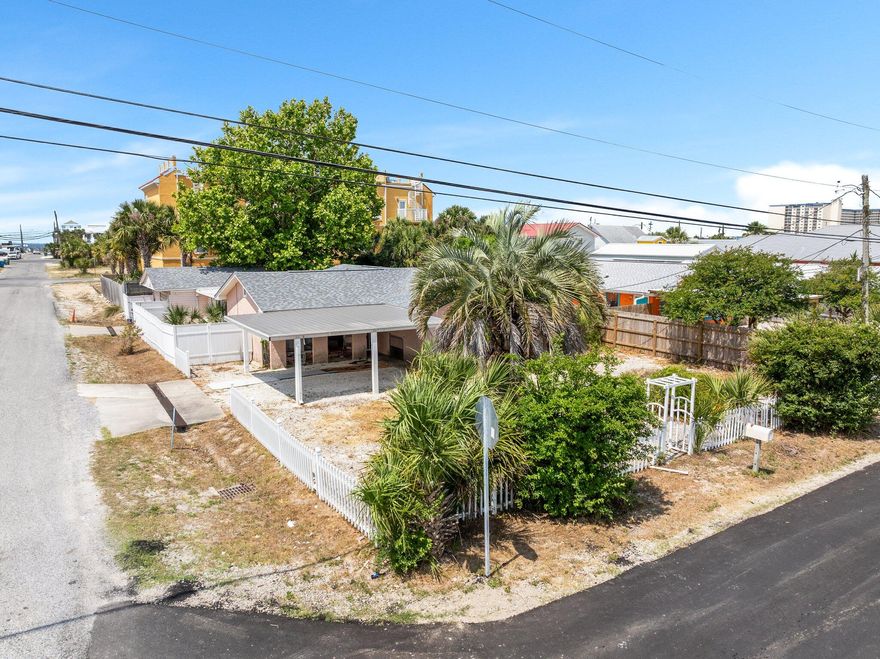 Welcome to your slice of paradise! This charming beach house, nestled just steps away from Beach Access 7, offers an incredible opportunity to embrace the quintessential coastal lifestyle in Panama City Beach. Positioned on a corner lot, this residence boasts an ideal location that allows you to relish in the vibrant atmosphere of this sought-after beach community. With 2 bedrooms, a bonus room perfect for an office or storage space, a den ideal for relaxation and entertainment, and a garage accommodating one car plus storage space, this home provides both comfort and versatility. Only three blocks from the pristine white sandy beach, you'll have easy access to endless days of sun, sand, and surf. Surrounded by a myriad of vibrant shops and restaurants, convenience and entertainment are a always at your fingertips. This home's layout and ample space offer a canvas for you to unleash your creativity and personalize to your taste. Positioned on a corner lot, it provides enhanced privacy and a sense of spaciousness. A nice fenced-in side/backyard offers the perfect space for relaxing outdoors. Additionally, the roof was replaced in 2019. Don't miss out on this fantastic opportunity to own a beach house brimming with potential. Seize the chance to create your dream coastal retreat in Panama City Beach!