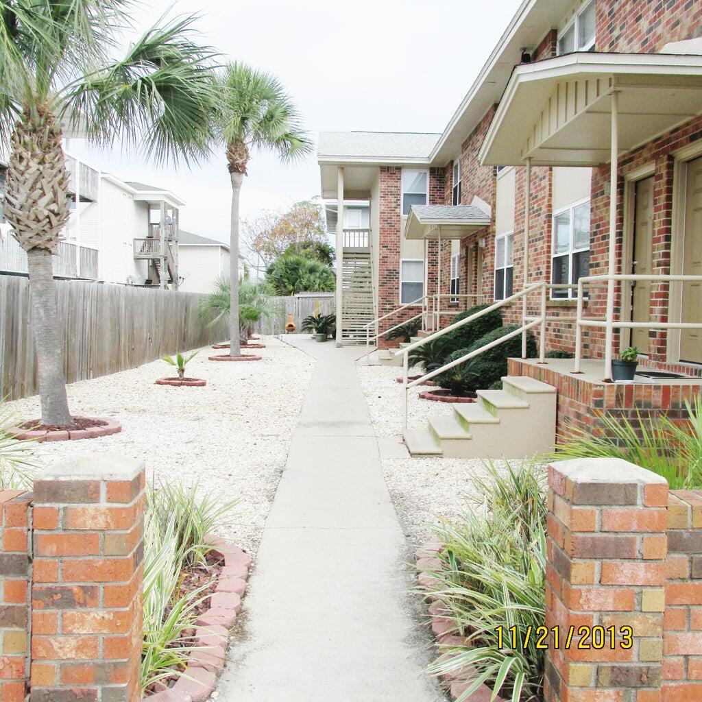 The island life awaits at 363 Bluefish Drive! This cozy 2BR/1.5BA townhome for rent on Okaloosa Island is conveniently located across the street from the beautiful beaches of the Emerald Coast. Unfurnished and spacious, this rental  is   available now for a 12 month lease. The living room, kitchen and dining room are located downstairs, in addition to a half-bath. Upstairs, you will find two large bedrooms and the remaining bathroom. Enjoy evenings spent on the outdoor patio, or watching the sunset from the sandy shores of Fort Walton Beach, Florida! Trash and washer/dryer are included. No smoking and not pets!