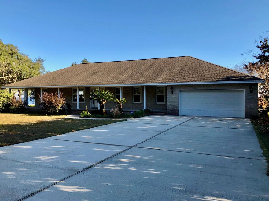 An amazing view from east to west on Choctawhatchee Bay. Conveniently located from Bluewater Bay and Freeport for shopping, restaurants, medical and recreation. Enjoy approximately 100' of waterfront viewing out your kitchen, living room, dining area, master bedroom, laundry & extra room. This open floor plan with kitchen, dining area and living room view of Choctawhatchee Bay! Home has 2 bedrooms, 2 baths with tiled flooring in the bathrooms, kitchen, dining area, laundry and extra open room off of garage. The kitchen has an amazing amount of cabinets for storage, all appliances convey (refrigerator, microwave, stove and dishwasher). Large countertop with area to seat 5 people with a dining area for additional seating. Carpet in the living room, hall and both bedrooms.