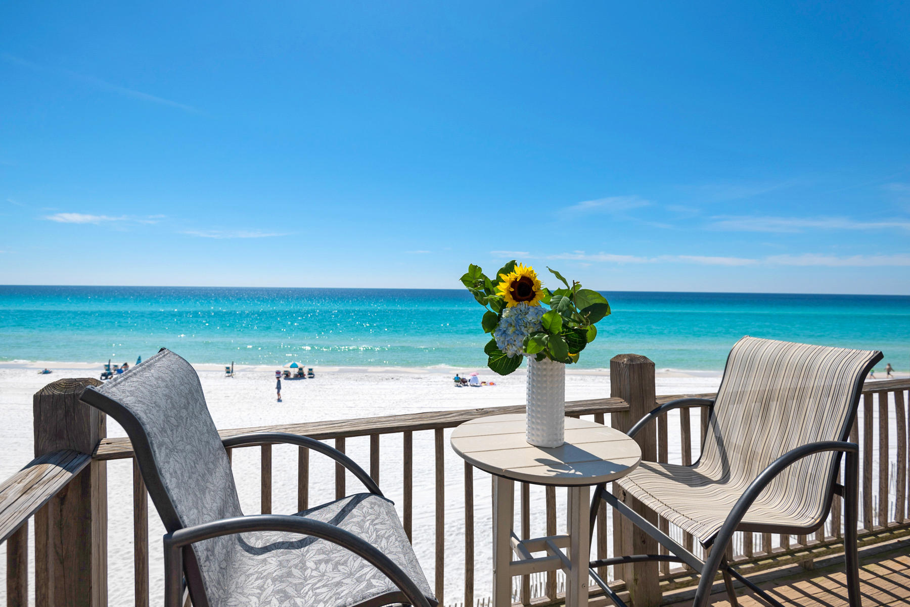 Rare, Gulf front opportunity for 2 side-by-side townhomes (units 3&4) in Seagrove Beach. Beautifully renovated, and a location that can't be beat. Have your cake & eat it too here - Toes in the sand, everyday views, NO HOA, and access to two pools (one heated) for a small annual fee. Bright and cheery colors & tasteful new decor. A connecting door between the main floor kitchens of each unit transform 2 bedrooms to 4! Open kitchen and living areas lead to the massive deck area offering sweeping views. Capture the beauty of the crystal clear waters of 30A beaches from the top floor gulf front master bedrooms. Guest rooms on each side offer a queen bed & bunks. Sleeping 12 comfortably, your beach retreat awaits. Excellent rental at 190K gross with owner use. Pool access is through Summer's