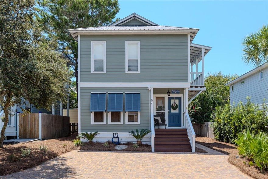 Offered turn-key and fully furnished, Rockstar Getaway in Blue Mountain Beach Highest elevation on 30A.  Nestled on a tranquil dead-end street off scenic Highway 30A, this 4-bedroom, 3-bath beach home sits on a .21-acre lot, just a short stroll from pristine beaches, boutique shopping, and dining. With no HOA, whether you're seeking a full-time residence, investment, or vacation haven, this home fits the bill with its bright coastal decor. The main floor features spacious open living areas, a fully equipped kitchen, a bedroom, and a full bath.  Upstairs, the home offers three additional bedrooms, including a primary suite complete with a king bed, work desk, ensuite bathroom. Check out this amazing home that also Upstairs, the second bedroom also features a king bed, while the third bedroom is ideal for guests with two single beds. A full bathroom in the hallway upstairs serves the second and third bedrooms. Adjacent to the stairs, a private outdoor deck furnished with Polywood furniture provides the perfect spot for relaxing.

This home is equipped with five Roku smart TVsone in each bedroom and another in the living room. The back porch and patio, perfect for dining or lounging. A Weber charcoal grill makes outdoor cooking a breeze. 

With no HOA constraints, Rockstar Getaway is just a short walk to great restaurants like Cowgirl Kitchen, Blue Mountain Creamery, Mimmo's 30A Ristorante Italiano, and Blue Mountain Bakery. 

Embrace the coastal lifestyle and make this home your personal retreat.