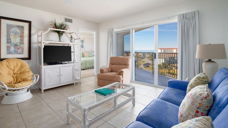 MAXIMUM RENTAL POTENTIAL at this 6th floor, 3 bedroom 3 full bath (2BR 2BA main + 1BR 1BA lockout) unit at Seacrest complex! This condo includes 1 reserved covered parking spot! TWO MASTER SUITES w/ water views and their own balcony access. The main kitchen comes fully equipped and has a pantry closet and washer/dryer storage closet. Kitchen overlooks the dining/living space and has a breakfast bar for additional seating. Mirrored living room expands your view of the Gulf! Tile in common areas, carpet in bedrooms. The 1 BR lockout unit has its own mini kitchen and balcony! Unit being sold fully furnished. Seacrest complex includes a spacious INDOOR & OUTDOOR community pool, elevators, covered parking, and beach access.