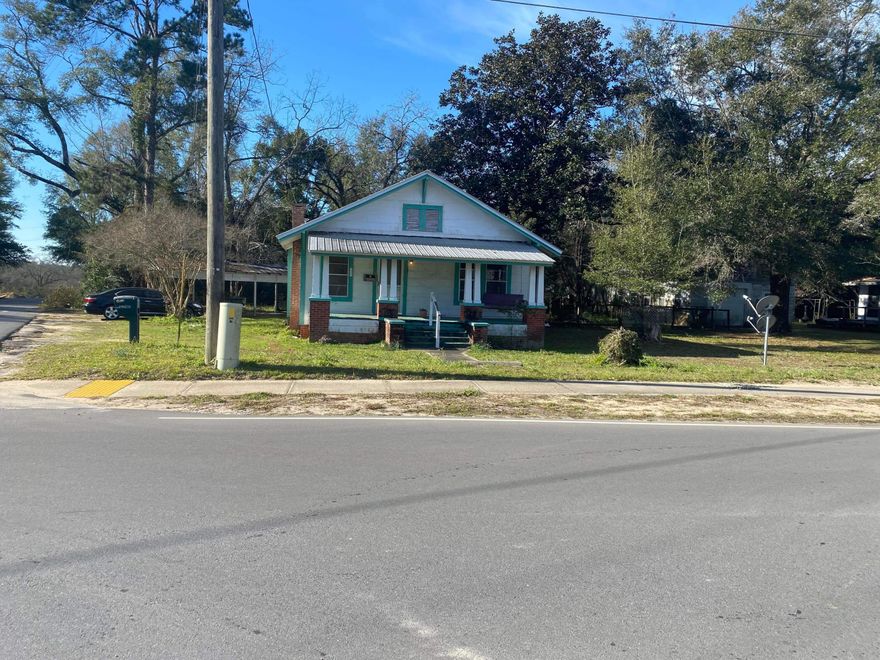 Large home in the heart of DeFuniak Springs, near 331 S.  Just a few blocks from the DeFuniak Springs Lake yard.   Home has 3 bedrooms and 2 bathrooms on the corner of 16th St.  and Live Oak Ave West.   Large front porch 8x25'  Home is ready for renovating and updating.  Nice backyard with some fruit trees. Cash Buyers only.   Home is being sold in ''AS IS'' conditions.  Price is  reflective of needed renovations. Lot dimensions subject to an up-to-date survey by Buyer.  Zoning C-1.  CASH BUYERS ONLY.