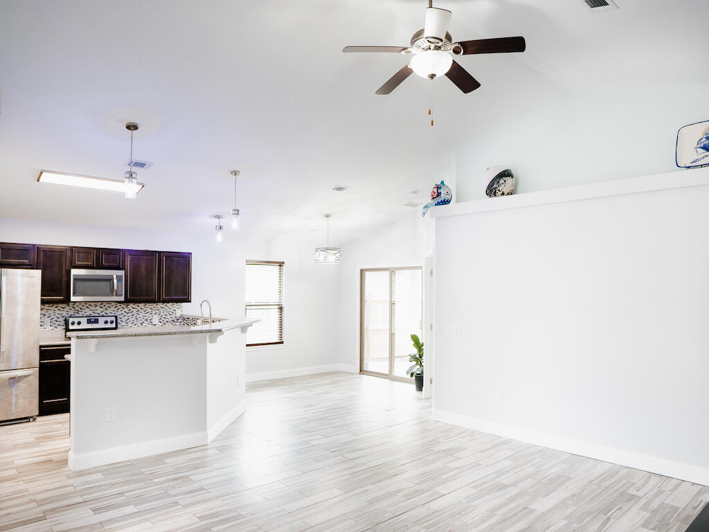Welcome home to this beautifully updated 3 bed, 2 bath home centrally located in Navarre!Pride in ownership truly shows with luxury finishes and updates throughout - these owners have moved on and you can now enjoy the fruits of their labors!Freshly updated bathrooms, drywall and ceiling refinishing, new baseboards & paint throughout, gorgeous quarter acre lot with fire pit and pergola for outdoor dining - the owners are even leaving the lawn furniture and 12'x16' shed for use during tenancy! Backyard is fully privacy fenced with producing blueberries and banana plants. Open floor plan, wood look tile throughout - you must see this home before it is gone! Washer/Dryer will stay with home for tenants convenience, unwarranted. ABSOLUTELY No Smoking/No Pets/NO Exceptions