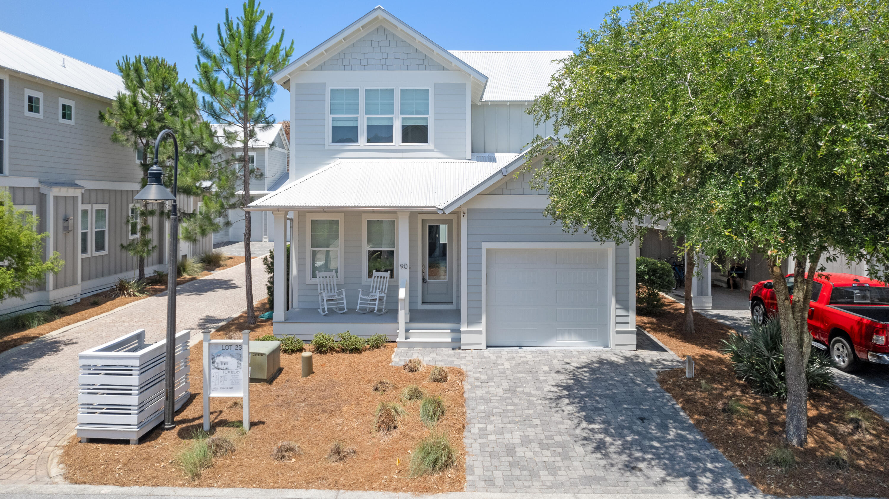 Finally available! Tupelo floor plan at The Village at Grayton Beach. This 3BR 2.5 BA, coastal cottage is ''the one'' with downstairs master and front porch living. The mud room and foyer at the front of the home lead into the open-concept kitchen, dining and living room with plenty of natural light and functional living space. Upstairs includes 2 additional bedrooms with a jack n jill bathroom and loft space/common area with huge storage area that could be office or flex space. A few of the features include wood shaker soft-close cabinets, granite countertops, designer tile and durable engineered flooring, cultured stone freestanding bathtub. Built to withstand the elements, energy and safety features include Jeld-Wen windows and gavalum roof. This 47-home community is in the final stages of building. Once the neighborhood is finished, homes at this price point will be hard to find available in this amazing location at Grayton Beach. A few desirable features include brilliant white painted wood shaker soft-close cabinets, granite countertops, engineered flooring, energy and safety features include Jeld-Wen impact-hurricane resistant windows, high speed structure wiring network, galvalum metal roof and much more.
This 47-home community is conveniently located in the heart of the Scenic Highway 30A corridor with a community swimming pool and green space to enjoy the beautiful weather. The community is just a short bike ride away from all that Grayton Beach has to offer including some of the world's best beaches and shopping, restaurants, and activities are within waling distance. Enjoy Grayton's park and ride available right across the street.