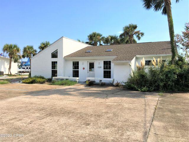 The building is 1,792 square feet and was completely renovated both inside and out. Features include: vaulted ceilings, four offices, conference room, and more. This building has been leased to an income producing tenant and lease conveys with sale. The seller is in the process of moving the east lot line of the property and having the property annexed into the city limits of Panama City. It will be zoned GC-1 (General Commercial). The lot line adjustment will reduce the lot size to +/-0.2 acres. The building is currently leased to ''Panhandle Behavioral Services. The annual net rent is currently $24,009, and the lease expires 8/31/24. The adjacent building on the corner at 1225 Airport Road is also available at $594,600. The building contains 4,260 SF. See MLS #725520