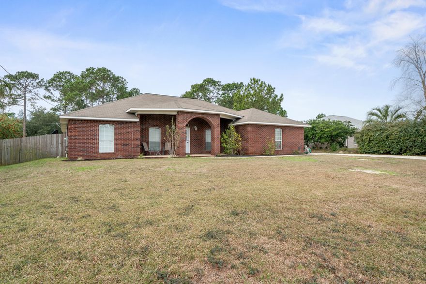 You will not want to miss this amazing custom all brick home located on a large lot right in the front entrance of Holley By The Sea. This home is a 3 Bedroom with a flex room, perfect for a play room, office, or a 4th bedroom. The large front arched porch out front makes for the perfect sitting area, a large driveway that can accommodate several guest vehicles.Seller to install new roof before closing.