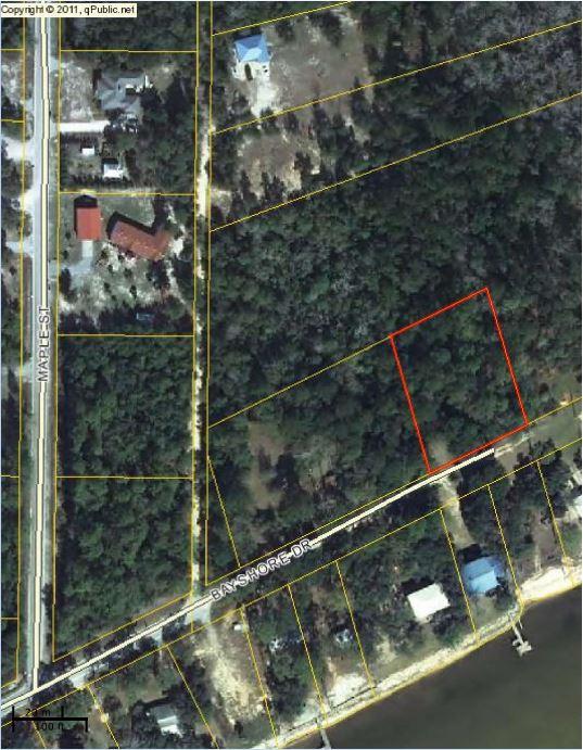 Build your dream home on this .69 acre wooded lot on a quiet street across from Choctawhatchee Bay. This lot is just south of Hwy 20 and is only 6.5 miles east of County Line Road (border of Okaloosa and Walton County). Lots like this in neighborhoods with flexible zoning are rare so don't miss out on this one!