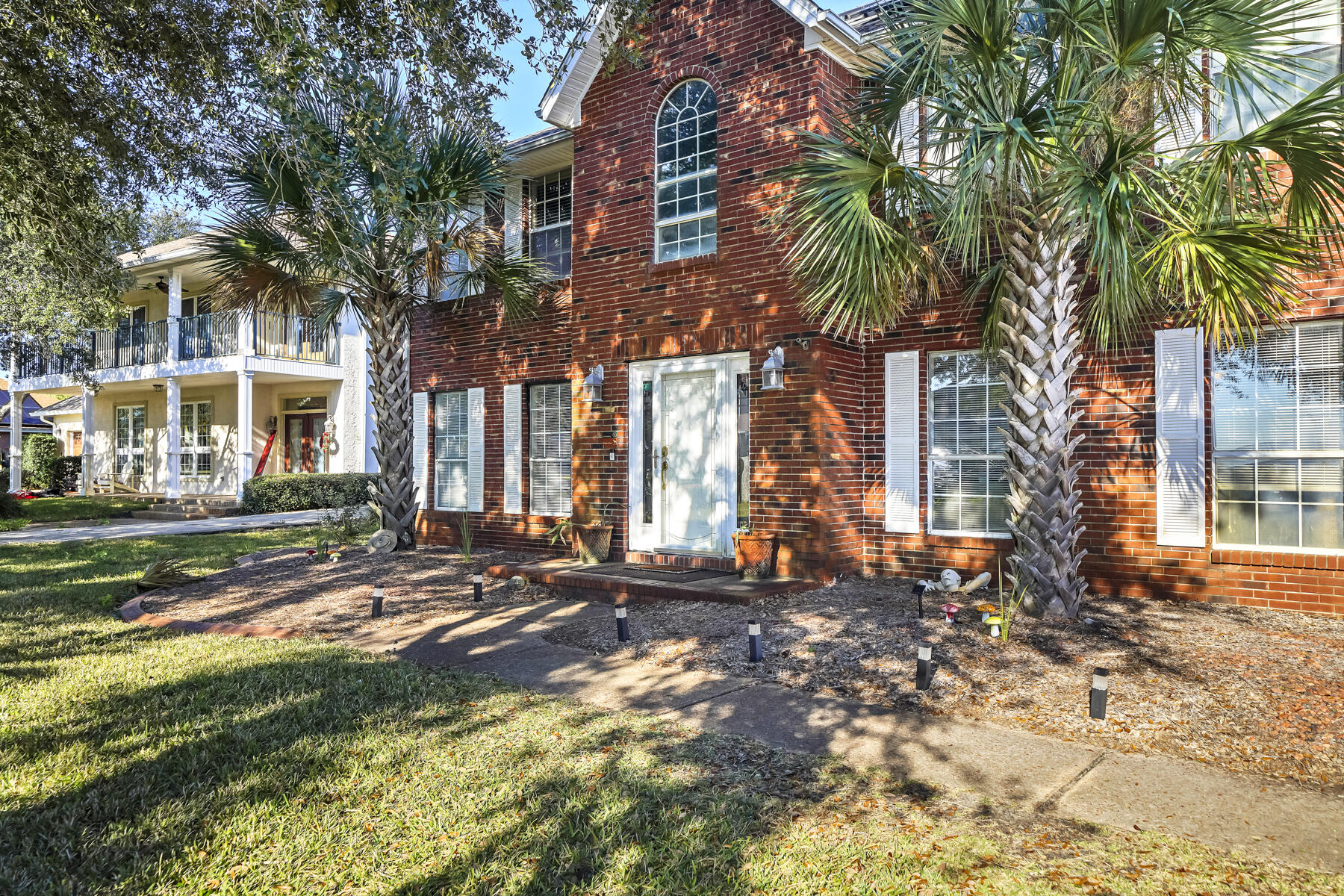 New Roof, New Flooring and Newer AC with a WATER VIEW and DEEDED BEACH ACCESS!! Look no further! This two story, spacious home is located in the highly coveted and perfectly located Emerald Pointe neighborhood. The bottom floor offers not one, but three separate living spaces with wood grain and slate flooring, that could also be used for office space. The large kitchen has stainless steel appliances, stone countertops, and plenty of cabinets. The master suite has plenty of space and the master bath has marble tile. The back deck offers views of the Santa Rosa Sound, as well as views from the front yard. The solar panels offer low energy bills and will be paid off at closing. Seller willing to offer buydown and also consider seller financing.