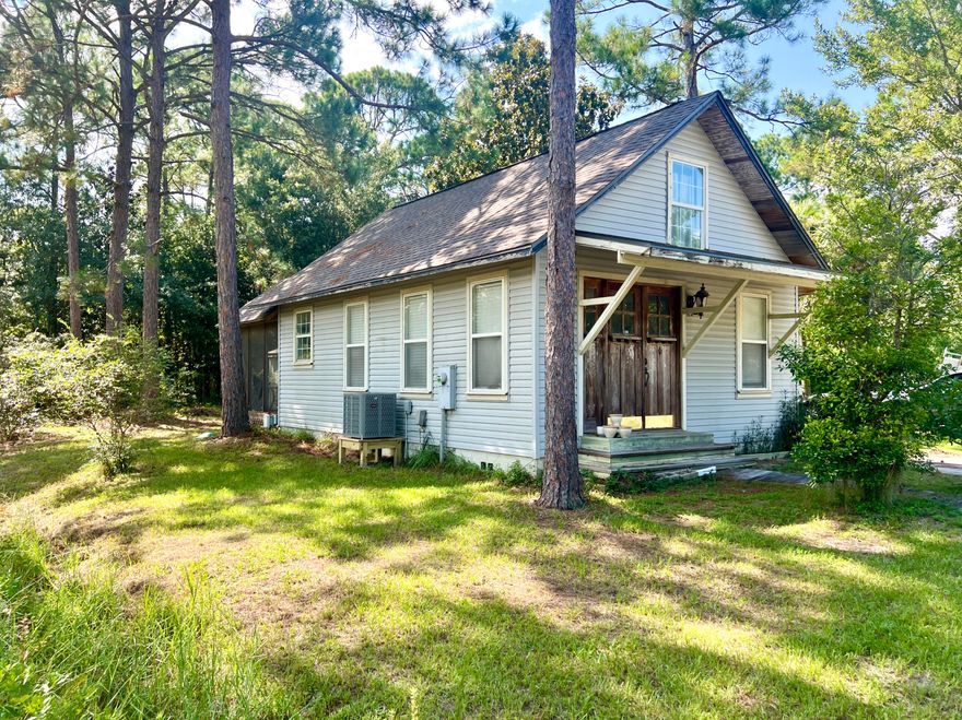 SELLER OFFERS UP TO $5,000 IN CLOSING COSTS. Located in the heart of Santa Rosa Beach, this home offers an opportunity to own a versatile property just moments from the Cessna Landing public boat ramp on Hogtown Bayou. This prime location is perfect for boating enthusiasts, because of its quick and easy access to the water for fishing, kayaking, or sunset cruises on the Choctawhatchee Bay. Have peace of mind with a new roof installed May of 2023 and a new AC installed August of 2025. What sets this lot apart is its rear access, providing the perfect spot to park a boat, RV, or other recreational vehicles. Whether you're seeking full-time coastal living or a vacation retreat, this property offers room to grow and flexibility to suit your lifestyle. The lot also has potential for a carriage house with income possibilities or to be used as a private space for family and friends. Enjoy quiet, local living just minutes from shopping, dining and the white sand beaches of 30A. This is your chance to embrace the laid-back Santa Rosa Beach lifestyle with boating and nature just steps from your front door.
