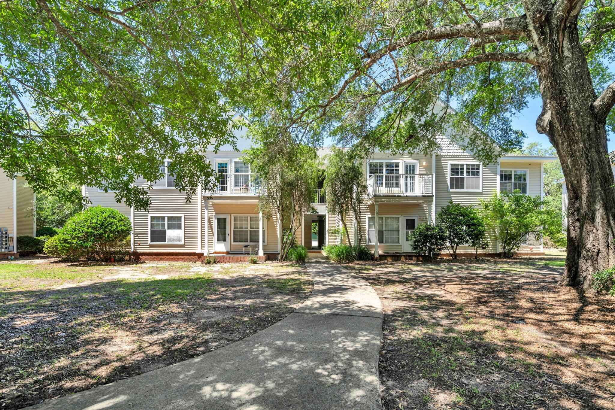 VA approved complex! Motivated seller! This spacious 2-bedroom condo is move in ready and offers the perfect blend of comfort and convenience. Nestled in a well-maintained and landscaped neighborhood, you'll enjoy the serenity of mature trees and lush greenery right outside your door. The Oaks amenities include a community pool, several picnic areas and gazebos perfect for outdoor gatherings. Ample parking is available. Spacious living area featuring custom built-in shelving and vaulted ceilings for an airy, open feel. Plenty of storage space and a bonus pantry that other units lack. Master bedroom is filled with natural light, creating a warm and inviting atmosphere. Both bathrooms have been updated with new vanities and mirrors. This unit is also updated with new LVP flooring throughout and a brand new oven/stove. Recently replaced roof ensures your investment is protected.
The HOA fee covers , master insurance, cable TV/internet, trash ground maintenance and exterior maintenance, making this a great investment property.
Conveniently located close to parks, shopping centers, and an array of restaurants, everything you need is just a stone's throw away. Niceville Middle and High Schools are both within a mile. The beautiful white sand beaches are only 25 min away.
Don't miss out on this charming condo that offers a peaceful retreat while being close to all the action. Schedule a viewing today.