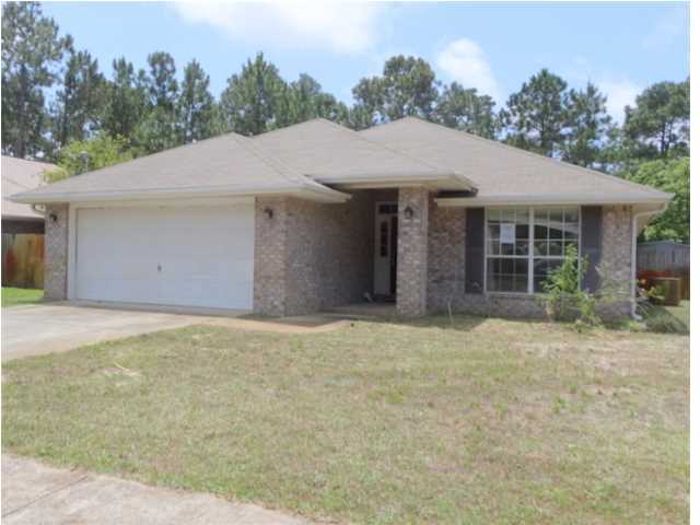 This home boasts open, split bedroom floor plan. The living has a lovely fireplace that that leads out to a screen enclosed pool. This 4 bedroom, 2 bath home is contemporary, functional, and move-in ready. The home boasts new carpet and vinyl, new kitchen appliances, fresh paint, and a new pool liner. The location is great as it is close to schools, the beach, and Hurlburt! This property is being sold AS IS. All information is approximate and should be verified.