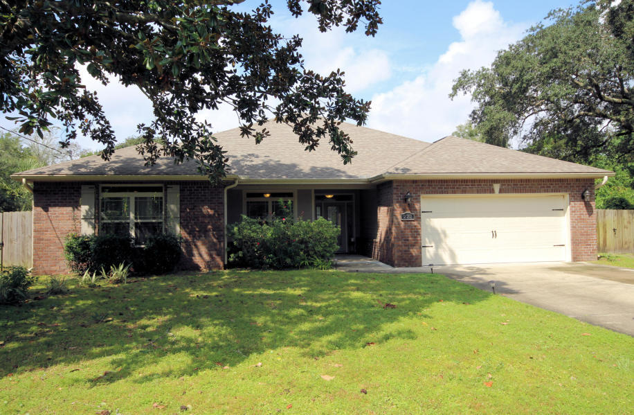 Perfect modern home conveniently located in between Eglin AFB and Hurlburt Field! This beautiful brick home is located on a quiet cul-de-sac with a spacious lot. As you walk into your new home, you will feel comforted by the high ceilings and open concept this home features. As you walk past the French doors of your new office on the left, you'll enter into your large living area with duel tray ceilings and recessed lighting. You'll notice that your large updated kitchen with stainless steel appliances opens into the living room making it ideal for entertaining. Your new home also features a split concept with three bedrooms down the hall from the kitchen and your large master on the opposite side of your living area. Your master bedroom has high tray ceilings with a large master bath. In