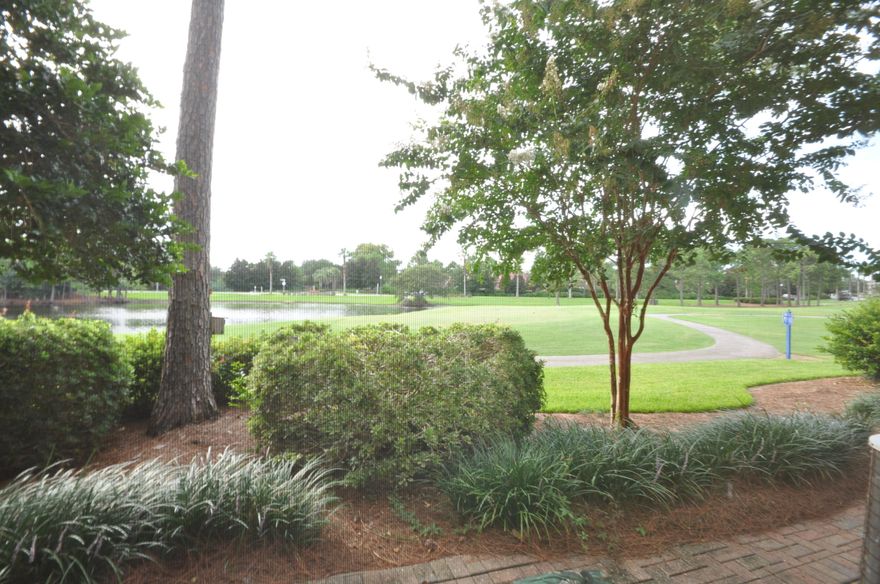 OWNER HAS JUST REDUCED OVER $25,000 Rarely available ground floor beauty with tranquil lake and Baytowne Golf course views. Good rental history, and many quality upgrades. Situated on the beach side of Sandestin Resort, and only a short distance to the beach, community pool, Beach House restaurant, and Sandestin owner's private beach club. This incredibly gorgeous home is complete with chic modern furnishings, ceramic tile, fresh paint, and crown molding throughout the kitchen, dining, and living areas. The kitchen has beautiful custom cabinetry, granite counter tops, and more thanenough storage space. The master bedroom has patio access and en suite master bath with a double vanity, and spacious walk in tile shower.This one has it all, including a private bunk hideaway for the kiddi