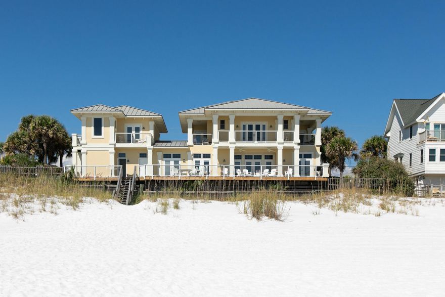THE LARGEST GULF FRONT PARCEL IN ALL OF MIRAMAR BEACH!!!For the first time in the property's history, we are proud to introduce Casa Madalena to a public offering. This exquisite beach retreat offers an unparalleled 125 feet of gulf frontage and a footprint that has little rivalry among the competition. Casa Madalena is a breathtaking gulf front beach home in Miramar Beach. The home's expanse of windows provide captivating views from almost every room and flood the home with an abundance of natural light. Complete with a carriage house and located near shopping and dining, this home has it all. Need a pool?Engineers have approved a pool and the permitting process is now underway! Upon entry, you'll find yourself in an open floor plan living space with a formal living room and a secondary seating area separated by a formal dining area. The first floor boasts 10 foot ceilings and impeccable views throughout. The kitchen also features stainless steel appliances, plenty of cabinet space, and marble counter-tops. There is also a guest bedroom on the first floor with a king bed. This room shares a bathroom with the main living area. The second floor of the main house is where you will find three more bedrooms including a spacious master.  Each of these three rooms enjoy their own private balcony.  The hallway opens up to the master bedroom through double doors and the view of the ocean immediately catches your eye through balcony doors. Also on this floor are two more bedrooms, each with a balcony and terrific views. Above the garage is the carriage home with its own balcony and breathtaking views. In this home, whether you choose to relax inside or on the back porch, the whole family can enjoy the sounds of the crashing waves and the ocean breezes. It is a rare find in the Destin area to have 3700 square feet under two stories on a gulf front home. Add to this the 125 feet of gulf frontage, the expansive decks, a two car garage, and no HOA fees, this property is one of the most desirable to hit the market in years! Although the home is move in ready as it currently exists, within this home is the option to possibly add two more bedrooms, and the large lot provides ample room for an expansion if needed. This home rests on pilings and is perched on 24' above sea level and has a retaining wall in place!