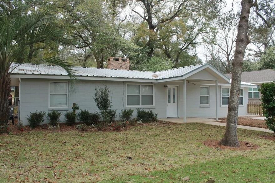 Come see this beautifully updated home in Niceville! Split floor plan 2 bedroom and 2 full baths with an additional bonus room. The home was updated in 2015 with tile floors, new plumbing, metal roof, and tankless water heater. New HVAC in 2023. The home has solar panels that keep the electric bill low.