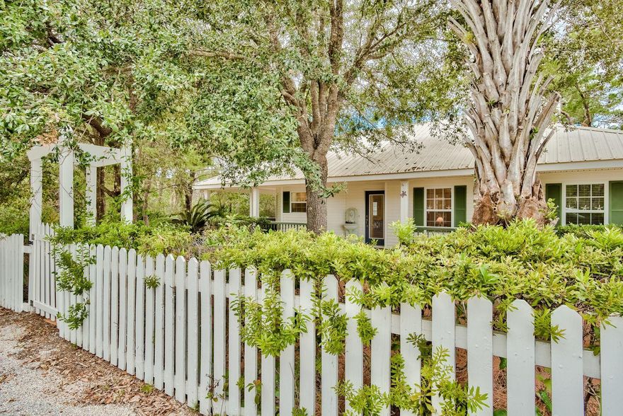 Located just a few short blocks from the beach, this adorable beach cottage is tucked back and hidden amongst the oaks. Sit on one of the many porches or cozy up to the fire place and enjoy life. This three bed two bathroom home has been meticulously maintained and never been on a rental program. The master is spacious with French doors leading out to a private patio. The possibilities are endless be it a full time residence or rental property. There is also room for a pool.