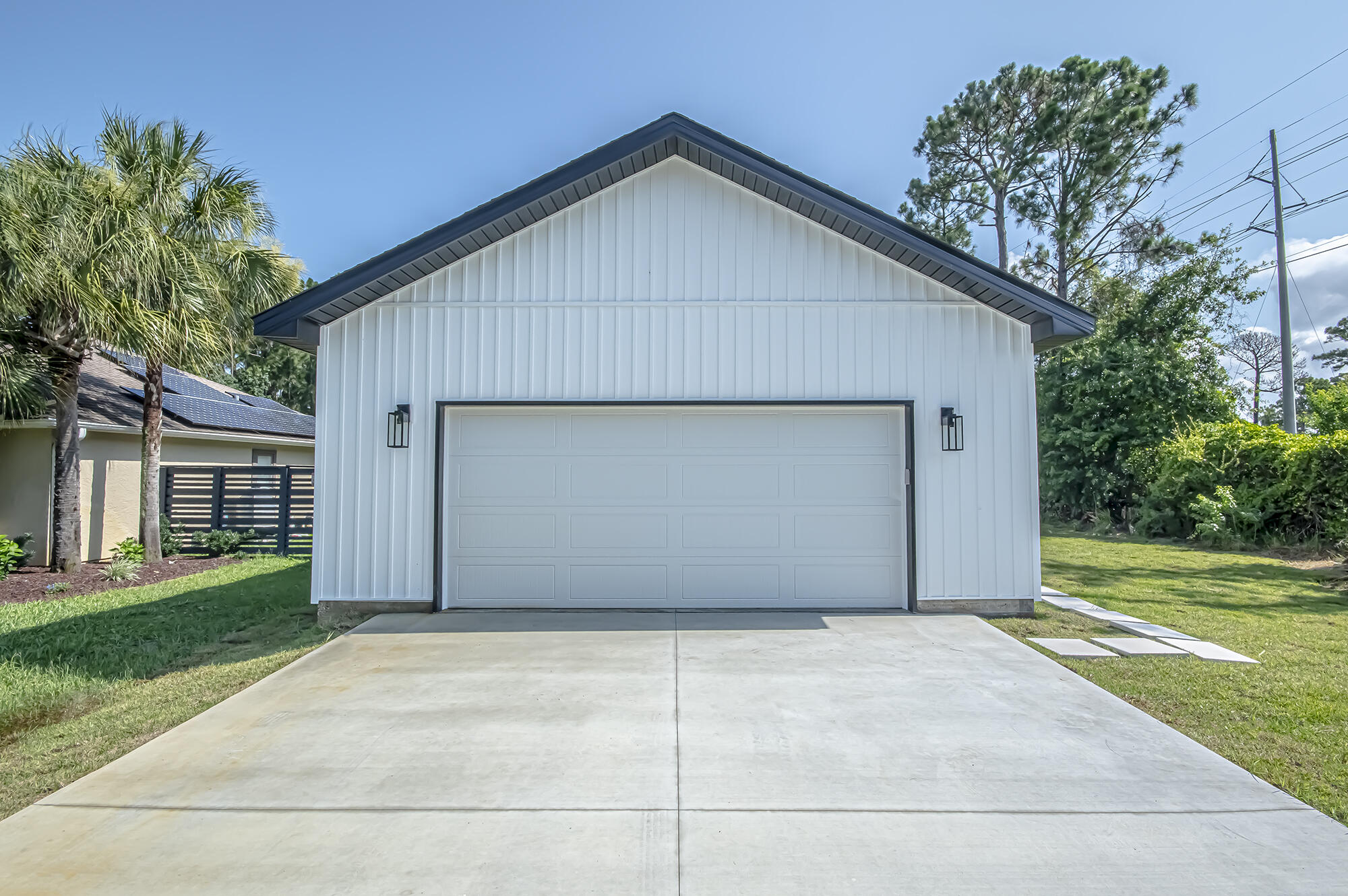 Welcome to 325 Hidden Island Drive, a remarkable new construction home that effortlessly combines modern style, thoughtful design, and a prime location. This stunning property features 3 bedrooms, 2 bathrooms, of meticulously crafted living space. Nestled within the desirable Hidden Pines community on Panama City Beach, this home offers a truly exceptional lifestyle opportunity. Key Features: ✨ Quartz Countertops: The kitchen serves as the heart of the home and is adorned with exquisite quartz countertops. These surfaces not only enhance the visual appeal but also provide durability and functionality for your everyday culinary endeavors. Luxury Vinyl Tile Flooring: Step onto luxury vinyl tile flooring that exudes both elegance and practicality. With its high-end appearance and resilience, this flooring choice brings sophistication to the living areas while ensuring ease of maintenance. ( Open Floor Plan: The open floor plan creates an inviting and spacious atmosphere, allowing for seamless flow between the living, dining, and kitchen areas. The design promotes a sense of togetherness, making it ideal for entertaining guests or enjoying quality time with loved ones. ( Large Back Covered Patio: Discover the perfect outdoor oasis in the large back covered patio. This versatile space offers endless possibilities for relaxation, alfresco dining, or simply unwinding after a long day. Enjoy the fresh coastal breeze and create cherished memories in your private outdoor retreat. Prime Location: This home enjoys a truly convenient location, providing access to some of Panama City Beach's most sought-after destinations. The nearby Navy Base, St. Andrews State Park, and the stunning Gulf of Mexico are just moments away, offering endless opportunities for outdoor recreation, from boating to fishing, hiking, and beachcombing. Additionally, the vibrant Pier Park is just a short drive away, providing an array of shopping, dining, and entertainment options for all ages. Contact me today to schedule your private showing and discover the endless possibilities that await you at 325 Hidden Island Drive. This home won't last long, so act swiftly to secure your slice of paradise in Panama City Beach!