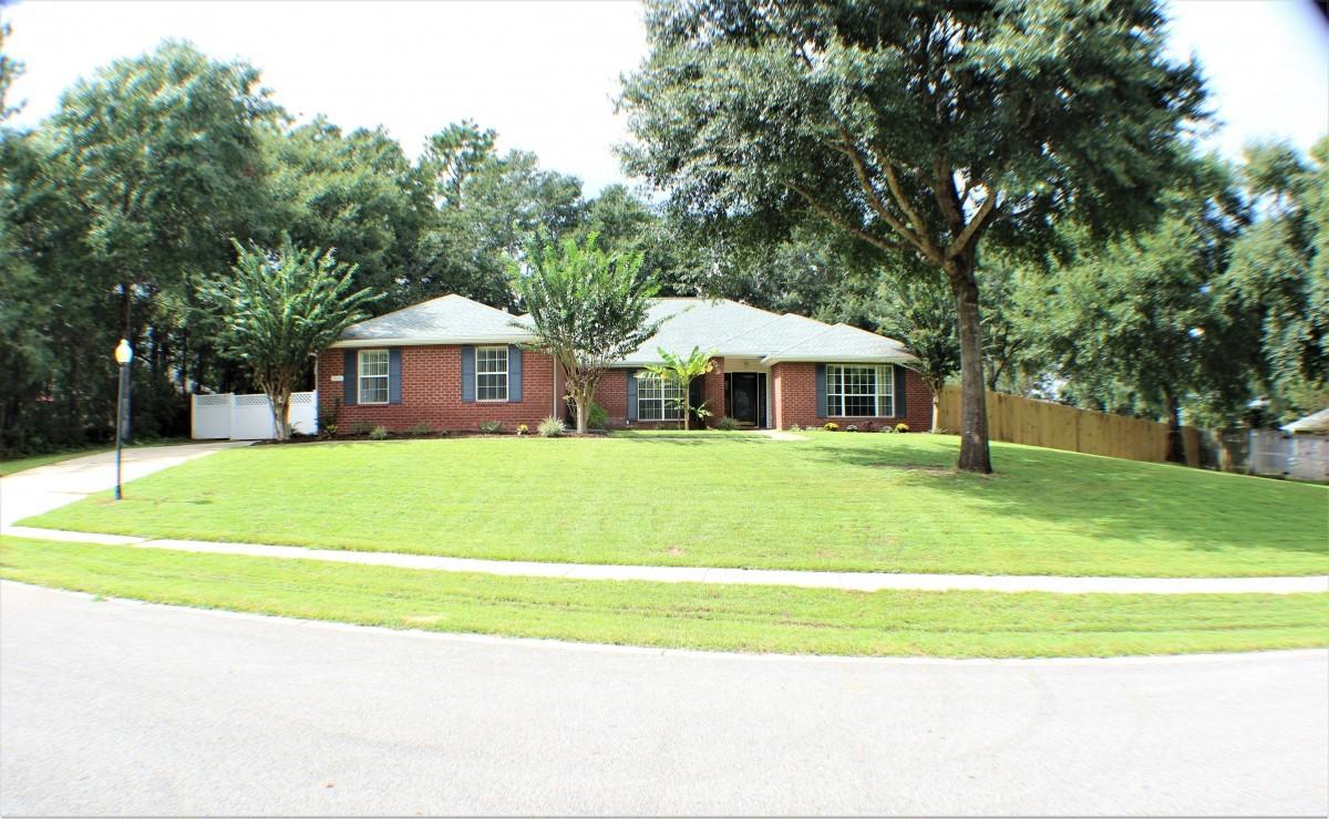 Beautiful home in one of Crestview's premier subdivisions, Silver Oaks. Located in a quiet cul-de-sac and a short walk away from the new community playground, this home has a great location. The interior features new carpet throughout bedrooms and living room, tile in wet areas and engineered hardwood in front room. Entire house has been freshly painted along with new door hardware and light fixtures. The kitchen has been remodeled into a showstopper with all new Whirlpool stainless steel appliances, a stone backsplash and newly surfaced countertops. The living room is a great place to relax with a new 70-inch fan for the hot summer days and a wood-burning fireplace for the cold winter nights.
