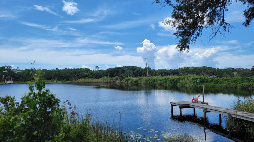 UPDATED LAKEFRONT VILLA LOCATED IN INLET BEACH ON BEAUTIFUL CAMP CREEK LAKE. NEWLY PAINTED, AND NEW FLOORING IN THE BEDROOM. EXTERIOR IS BEING PAINTED BY HOA. UNFURNISHED 1 BEDROOM TOWNHOME WITH LOFT. LOFT BEDROOM HAS AN ELEVATED 10' x 4'9' AREA WHERE YOU CAN SIT YOUR MATTRESS ON WITH WINDOWS THAT OFFER A BEAUTIFUL LAKE VIEW (AND GULF GLIMPSE!) SKY LIGHTS AND CATHEDRAL CEILINGS TO ALLOW THE NATURAL SUNLIGHT. WALK OR BOAT TO NEARBY INLET BEACHES. STORAGE CLOSET ON BACK PATIO THAT OVERLOOKS THE LAKE. TILE FLOORS & STACKABLE WASHER/DRYER. WATER TRASH & LAWN SERVICE INCLUDED. THERE IS A COMMUNITY DOCK YOU MAY UTILIZE. NO SMOKING, PETS, OR SUBLETTING.