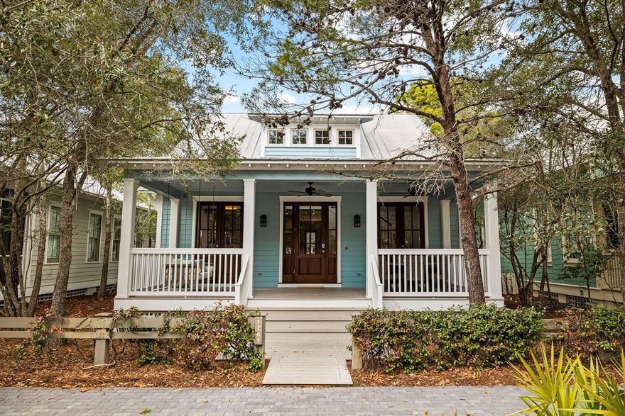 Welcome to 1261 Western Lake Drive--a quintessential Watercolor beach cottage located in the camp district and just one block from the popular Camp Watercolor.  This home features a spacious front porch for classic Watercolor outdoor living that opens into the living and dining area where you will immediately note the gorgeous soaring ceilings.  The dining area flows seamlessly into the kitchen and a hallway connects two first floor bedrooms and a screen porch & grilling area. The upstairs has two additional bedrooms, one with built in bunks--a perfect spot for kids to have their own space.  From its prime positioning, shopping & dining within the Watercolor Town Center, tennis/pickle ball courts and the recently overhauled Beach Club are all a short walk or bike ride away.