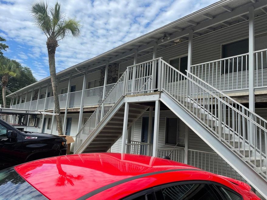 2nd floor all tile condo in College Park across from NWF State College and close to everything!. Rent includes water, garbage, pool care  and there are laundry facilities on site. Cats may be considered with prior owner approval and a non-refundable pet fee. Any person 18 years old or older must apply separately. Tenant will be required to carry renter's liability insurance. NO SMOKING / VAPING!