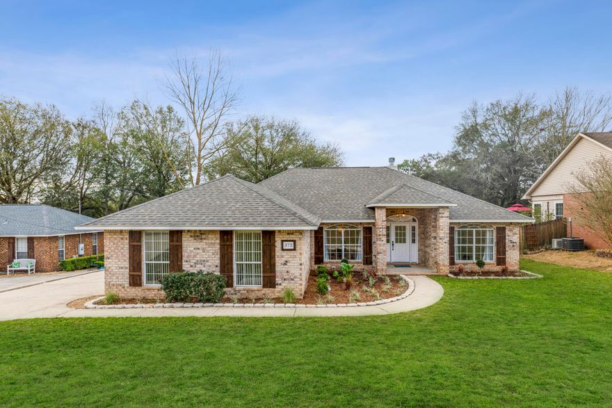 Completely renovated property in south Crestview! This 3 bed, 2 bath brick home has had a top to bottom -and more- makeover. New in 2022: roof, HVAC, water heater, flooring, sinks, counters, fixtures, fans & paint to name a few. Enter to a high-ceiling foyer flowing to the living room w/shiplap fireplace & formal dining. The flooring throughout is Cali Bamboo's Waterproof LVP! In the kitchen - new quartz counters, single-basin sink, updated cabinets & hardware, pantry, & new S/S appliances! And you can't miss the humongous bonus room w/multiple possibilities -office, playroom, game room or a combo! The large master bedroom has a trey ceiling w/ensuite that features a new marble counter double vanity.