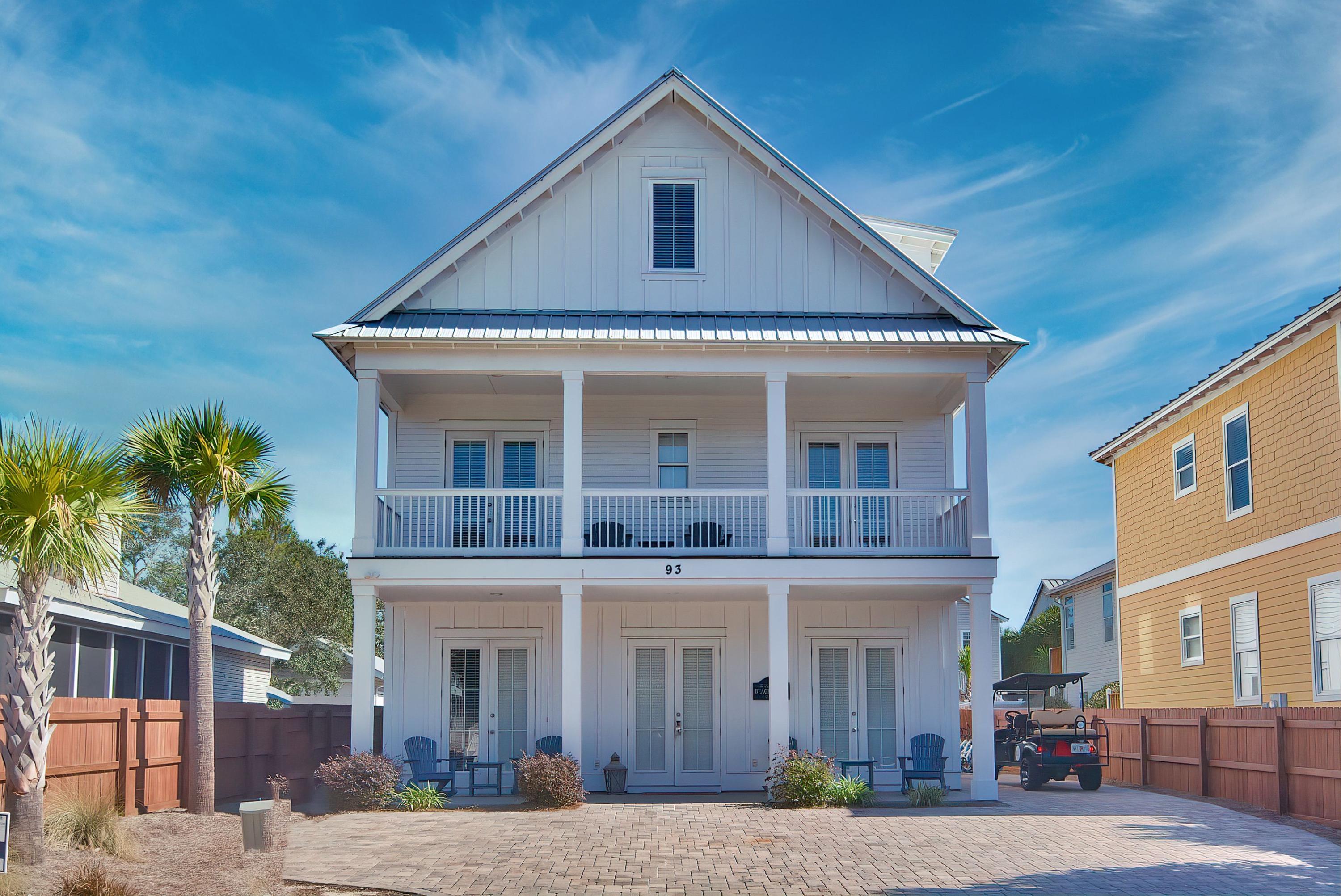 This fully-furnished coastal retreat is ideally located in the sought-after Crystal Beach community and offers several unique finishes and a strong rental history. Bright and spacious, the main living areas of the home feature wood-tile flooring and white wainscot ceilings. An exquisite chef's kitchen provides an inspiring place for preparing meals with its large island, stainless steel appliances, and beautiful blue tile backsplash. Perfect for hosting gatherings with family and friends, the kitchen flows into an inviting dining area with a wine bar. This three-floor residence offers accommodations on each floor and includes six bedrooms and a bunk room. The spacious suites and ample space for parking make this a perfect vacation home or investment property.