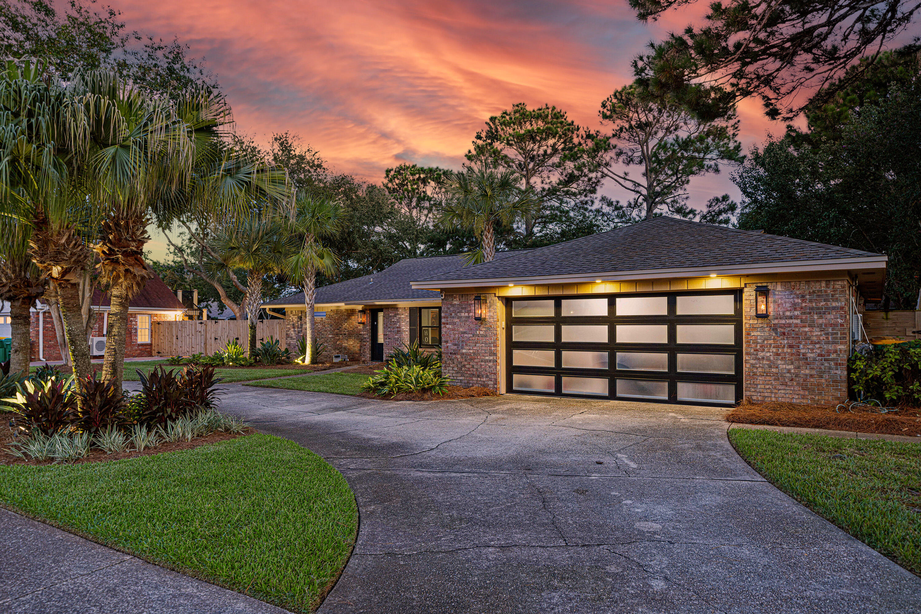 Located in beautiful Indian Bayou, this remodeled 3BR, 2BA open/split floor plan home has a media/office bonus room, dining room, great room and laundry room. The home offers many upgrades and special features throughout, including smart light switches and a water filtration system.Remodeled Kitchen with new stainless-steel appliances throughout including a Kucht Professional gas stove/oven, Samsung refrigerator, double stainless farmhouse sink, dishwasher, wine cooler, granite counter tops and backsplash. New flooring throughout, impact windows, gas fireplace w/ new gas logs and gas hot water heater. The large primary bedroom features a spa like bathroom with free standing soaker tub with a 45'' TV, separate shower with blue light dual showerheads, double vanity, and walk-in ... closet. The guest bathroom has also been fully remodeled with a beautiful tile shower and double vanity.
Step outside to an entertainment dream with a built-in summer kitchen featuring Lion stainless-steel appliances, natural gas grill, warming drawer, and refrigerator all trimmed out in a beautiful stone with leathered granite counter tops. The patio is completely covered with an entertainment lounging area, firepit and a 65" TV. Large backyard with an additional natural gas firepit area and plenty of room for a pool. The home includes Solar panels that let you enjoy an average utility bill of only $35.00/month (Solar panels will be paid in full at closing). Two car garage with upscale garage door and gas lanterns light up the front of the home with extra display/landscape lighting along the front to showcase the home at night.
Roof 2020, HVAC 2020, Solar panels 2022, W/H 2024, Windows 2025 and New Flooring 2025. Buyer to verify all information important to them.
The Indian Bayou Golf and Country Club is a semi private 18-hole course featuring a Bar and Grill. Neighborhood sidewalks throughout the community located in the Heart of Destin just minutes to beaches, shopping, restaurants and executive airport.