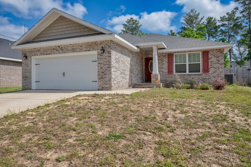 Sellers offering $5k towards buyer's closing costs.  Stepping through the foyer, you'll be drawn to the vaulted ceiling, wide open floor plan, luxury vinyl plank flooring, granite kitchen counters, soft close cabinetry, and so much more. Garage access is off the kitchen through the large laundry room. The master bedroom is to the rear of the home and features new wall to wall carpeting, tray ceiling and back yard access. The en-suite master bathroom has a double vanity, dual walk in closets, separate soaker tub and stand up tile shower. Two spare bedrooms and full size bathroom are located on the right side of the home. Heading out back, the covered lanai is perfect for grilling and/or relaxing, overlooking the spacious back yard. Located 15 min from the beach and 25 min from Hurlburt Fld