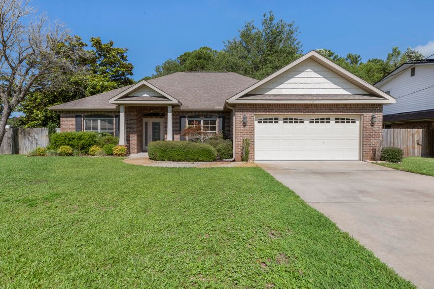 All-brick contemporary single story home just 5 miles from Hurlburt Field, this 4-bedroom split, open floor plan enjoys a ''big feel'' with 10' ceilings in the foyer, great room and kitchen. So many extras include the beautiful glass front door with matching side lights, crown molding in the dining room, and the relaxing lanai in the backyard. Large master bedroom includes spacious walk-in closet, tray ceiling and bath enjoys cultured marble double vanity, garden tub & separate shower. Kitchen includes granite countertops, raised breakfast bar and large pantry. Yard is fully fenced w/front & backyard sprinkler system. Home is ready for a quick close so you can start enjoying your summer enjoying the beautiful Emerald Coast!