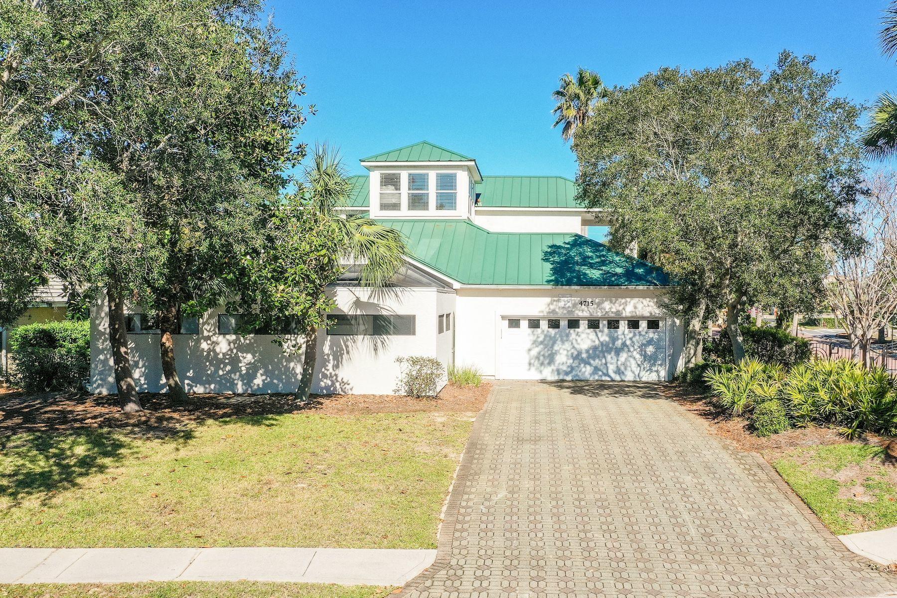 This recently renovated beach retreat is tucked in the gated community of Destiny East and offers convenient beach access and a proven rental history. This well-maintained coastal home features several elegant upgrades, including new flooring, a fresh coat of paint, and new furnishings that convey with the home. Open and spacious, the home includes two levels of luxurious living space. A perfect vacation retreat or primary residence, the three-bedroom home can efficiently accommodate up to 13 people with two master suites, a large guest bedroom, and a loft area with bunks. This beach home provides plenty of ways to enjoy life on the Emerald Coast. Sliding doors lead out to a private backyard oasis with a heated pool. A summer kitchen with a wet bar and grilling area makes entertaining...