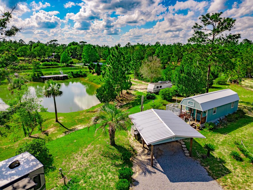 PRIME REAL ESTATE! INVESTORS!! Take a look at this appx 7.78 acres (+5 additional acres).  Hwy 331 South is in eye sight of this property. Only minutes from the Sugar Sand Beaches of South Walton this property features 2 homes, one double wide with build ons and one single wide mobile home as well as appx 7RV site hook ups, 7 stocked fish ponds, gazebos, decks for fishing, docks, swings for relaxing, garden area, trails and roads already put in place.  Owner is in the process of renovating a building for a general mercantile store or possibly turned into another short term rental.  Buyer to verify all info. Additional 5 acres with double wide is a seperate parcel but included in price.  Appx. 2 miles from interstate 10 exit ramp.