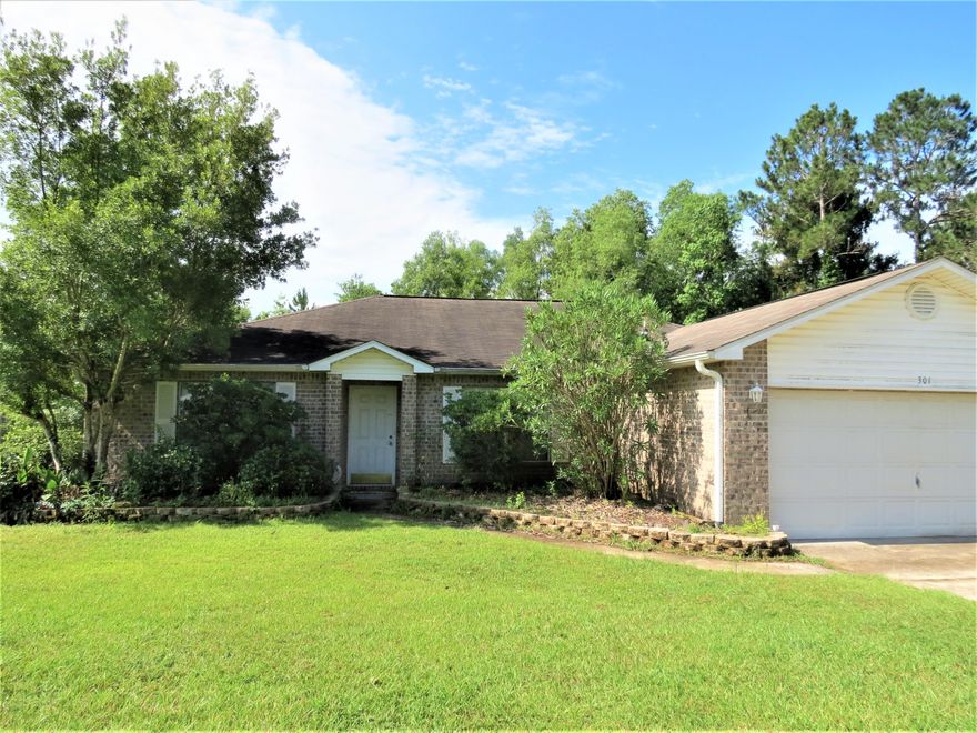 Location Location Location! This home is situated perfectly in town as it boast a short drive and easy commute to your local bases, beaches, shopping, and doctors offices. This home has been well taken care of over the years and is move in ready! Home features a spacious living room, high vaulted ceilings with built in ledges to display your beautiful home decor. The split floor plan design will provide the extra privacy you deserve after a long days work. The master suite features a spacious bedroom, a bathroom with double vanity, a garden tub, and a huge walk in closest. If you are the outdoors type and love to entertain this large lot is a must! This large fenced lot will provide plenty of room for the kids to play and areas to entertain for those family gatherings and weekend BBQ's.