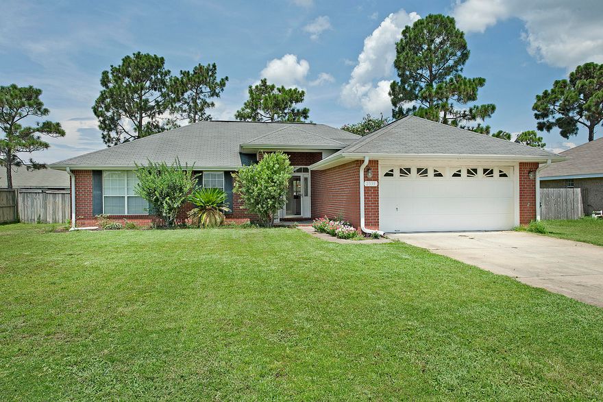 Come see this beautiful 4 bedroom 2 bath all brick home. Centrally located just minutes from Hurlburt Field, Navarre Beach, and Walmart. Home sits on almost 1/4 acre and includes a fully fenced in backyard. Enjoy an open/ split floor plan, eat in kitchen/dining room, large master bedroom, 2 car garage and much more!