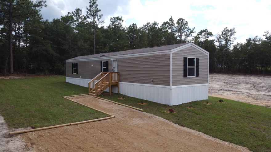 Price reduced $19,500!!!  VA APPROVED This New 2022 Clayton manufactured Home has a lot to offer,3 bedroom 2 full baths loaded with upgrades including Frigidaire appliance's, Carrier Hvac., low maintenance vinyl wood flooring, energy grade windows, smart thermostat, pressure treated wood Stairs, 200-amp electric panel and more.This home is located on a paved street in Oakland Hills subdivision.Water, septic, electricityLot size 80x122 lot 18
