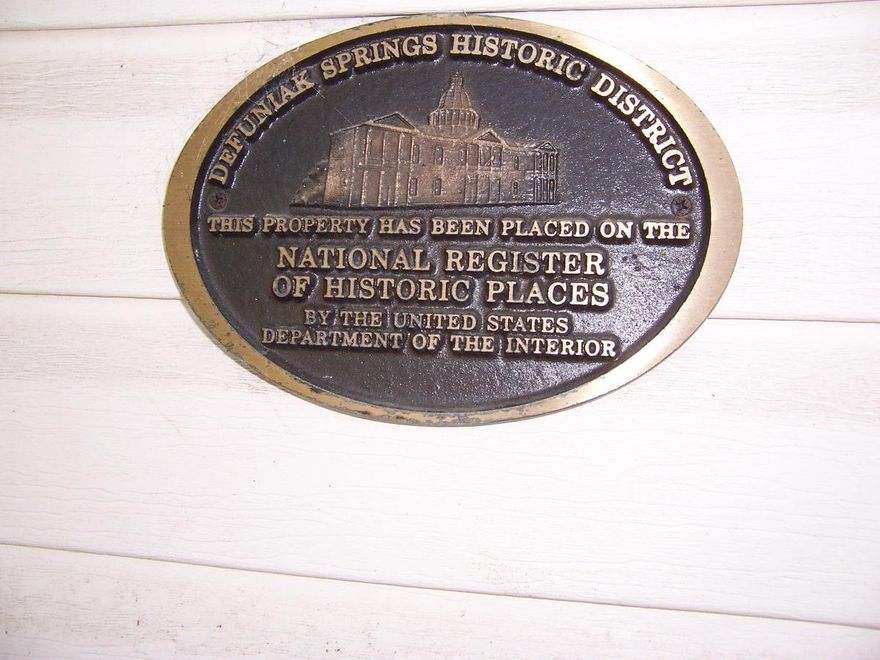 Foreclosure!!! Huge historic home walking distance from the Lake Yard! Amazing opportunity to purchase a 2 story 3400 sqft house in the heart of town. Fenced corner lot. The home has tall ceilings, large wrapping porches and several balconies. Home is in need of TLC and does need work, but has huge potential.