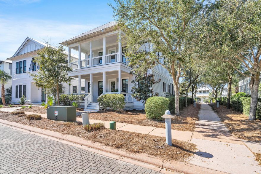 Nestled within the picturesque Cypress Dunes subdivision on the West End of 30A's south side, this delightful home presents over 2600 square feet of living space, fully furnished with high-end designer furniture and accessories. Recently painted on the exterior, the residence boasts three large bedrooms alongside a tucked-away bunk room.Upon entry, a welcoming foyer awaits, ideal for dropping off your beach hat after a day at the beach. The first floor hosts two spacious bedrooms (both with new carpet) with en suite bathrooms, as well as a cozy bunk room nook. A Southern style porch off the front door offer views of the neighborhood's famed wooden bridge and Cypress pond, while a 2-car garage with storage, at the back of the home, provides ample space for vehicles and beach gear.