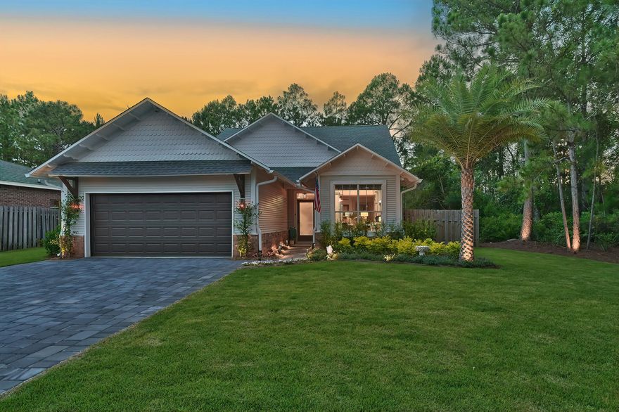 Coastal living awaits at this craftsman-style residence nestled within the private non-rental community of Calle Escada on the West-end of 30A. Flanked with lush vegetation and a stately paver driveway, the homesite is bordered by a conservation area to the right and abuts to the Point Washington State Forest providing the utmost level of privacy.  

Overflowing with natural light, the newly curated floor plan showcases tall ceilings and high-end finishes throughout. Spanning the front corridor of the abode, the gourmet kitchen features ample cabinetry, a luxury appliance package with gas range, and quartz countertops paired with a stunning backsplash and contrasting black waterfall island.  The dining area with soaring vaulted ceilings seamlessly flows into the living area with fireplace and shiplap accents. Situated on the first floor, the main suite is a retreat with dual wardrobes, space for a sitting area or desk, and an additional storage area integrated under the stairwell. The sumptuous en-suite boasts a dual marble vanity and custom walk-in shower with floor-to-ceiling tile and dual rain shower heads. 

Three additional bedrooms are found on the second floor in addition to a spa-inspired bathroom with custom tiled tub. 

Synonymous with relaxation, the backyard provides a true escape.  The screened porch is currently configured with a hot tub and sitting area overlooking the koi pond. 

Just outside the porch, the extended paver patio encompassed a fire pit, grilling area, and outdoor living area anchored by bamboo, podocarpus, palmettos, and a variety of fruit and citrus trees. 

Ample community amenities include a lakeside pool, basketball court, tennis court, playground, clubhouse, and direct access to Greenway Trail. Greenway Trail provides connectivity to the sugar-white sand and turquoise-hued waters, Butler Elementary School, and all of the world-class dining and entertainment venues the West end of 30A has to offer. 

Notable features from the recent $150k+ remodel include luxury appliances, flooring, paint, plumbing fixtures, electrical fixtures, electric car charging infrastructure, recently replaced roof, and recently installed HVAC system with UV air filtration integration. Inquire today to schedule a private viewing and start living the coastal lifestyle you deserve.