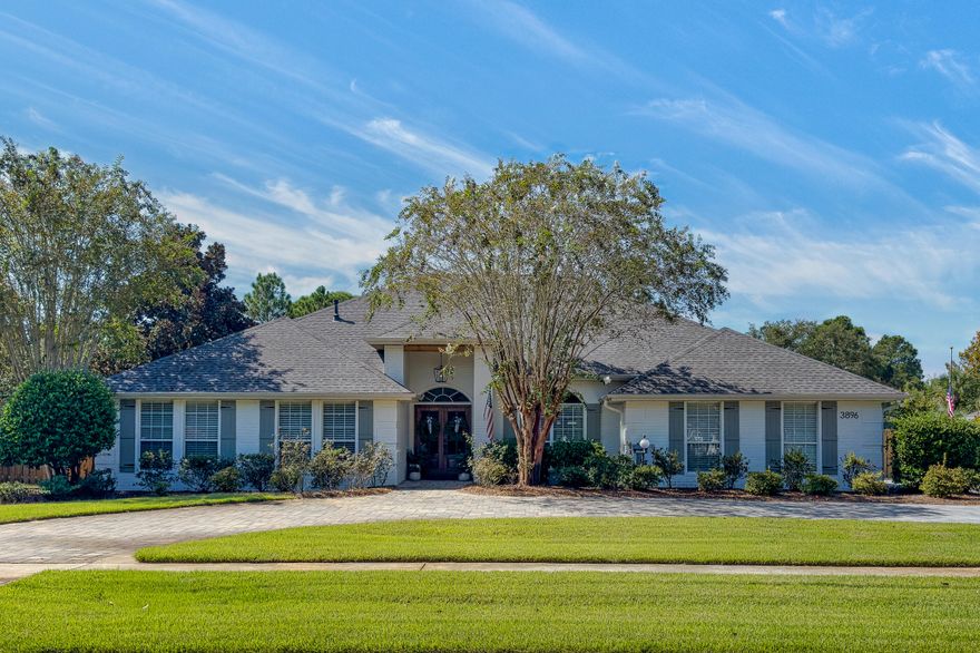 Welcome to 3896 Indian Trail, a beautifully updated 4-bedroom, 3-bath brick home with a private pool, located in the heart of Destin across the street from Choctawhatchee Bay.  Blending timeless charm with thoughtful upgrades, this home offers nearly 3,000 sq. ft. of living space designed for comfort, style, and everyday functionality. Step inside to find a spacious open-concept floor plan anchored by a cozy gas fireplace with a new mantle and surrounded by painted brick accents. The living areas are elevated by tongue-and-groove wood ceilings, crown molding, a wood beam detail, custom window trim, and accent walls that bring warmth and character throughout. Recessed lighting and all-new lighting fixtures, both interior and exterior, add a fresh modern touch and create an inviting.... ..atmosphere. The chef's kitchen features a large island, a gas range, and a walk-in pantry, perfect for entertaining or family gatherings. A built-in Murphy bed with custom cabinetry in the office provides flexibility for guests or multi-use space. The grand primary suite includes a sitting area with tray ceilings and a fully refreshed bathroom featuring a new vanity, accent wall, garden tub, separate shower, and dual walk-in closets. Recent updates ensure peace of mind and efficiency with a new HVAC system installed in 2025, a tankless water heater added in 2022, fully paid solar panels, and an epoxy garage floor. The home also boasts new exterior paint, and shutters, enhancing both curb appeal and functionality. Outdoor living is at its best with a private in-ground pool, a spacious yard complete with playground, batting cage, and a covered outdoor entertaining area perfect for watching the games on a Saturday. The long driveway provides ample parking, for boats, RVs, or multiple vehicles. Centrally located on Indian Trail, this home offers convenience to shopping, dining, schools, and all the best of Destinall without HOA dues and restrictions. Thoughtfully upgraded and move-in ready, this property offers the perfect balance of style, function, and coastal lifestyle. Call today to schedule your private tour. 