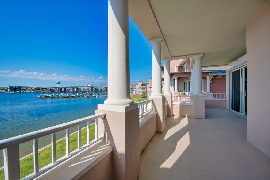 FRESHLY REPAINTED UPDATED UNIT!Gorgeous intracoastal water views! This unit boasts incredible views of the bay, along with a 16x40 deep water boat slip! Being one of the larger boat slips in this community it also offers 2 jet ski lifts with plenty of room, taking only about 10 minutes to Crab Island! This Mediterranean style condo is located on the 3rd floor, featuring a spacious 2 car garage with an additional storage unit! The unit features a large living room, dining area, wine area, as well as an open concept kitchen, offering upgraded appliances, granite countertops, wood cabinetry, and travertine flooring.