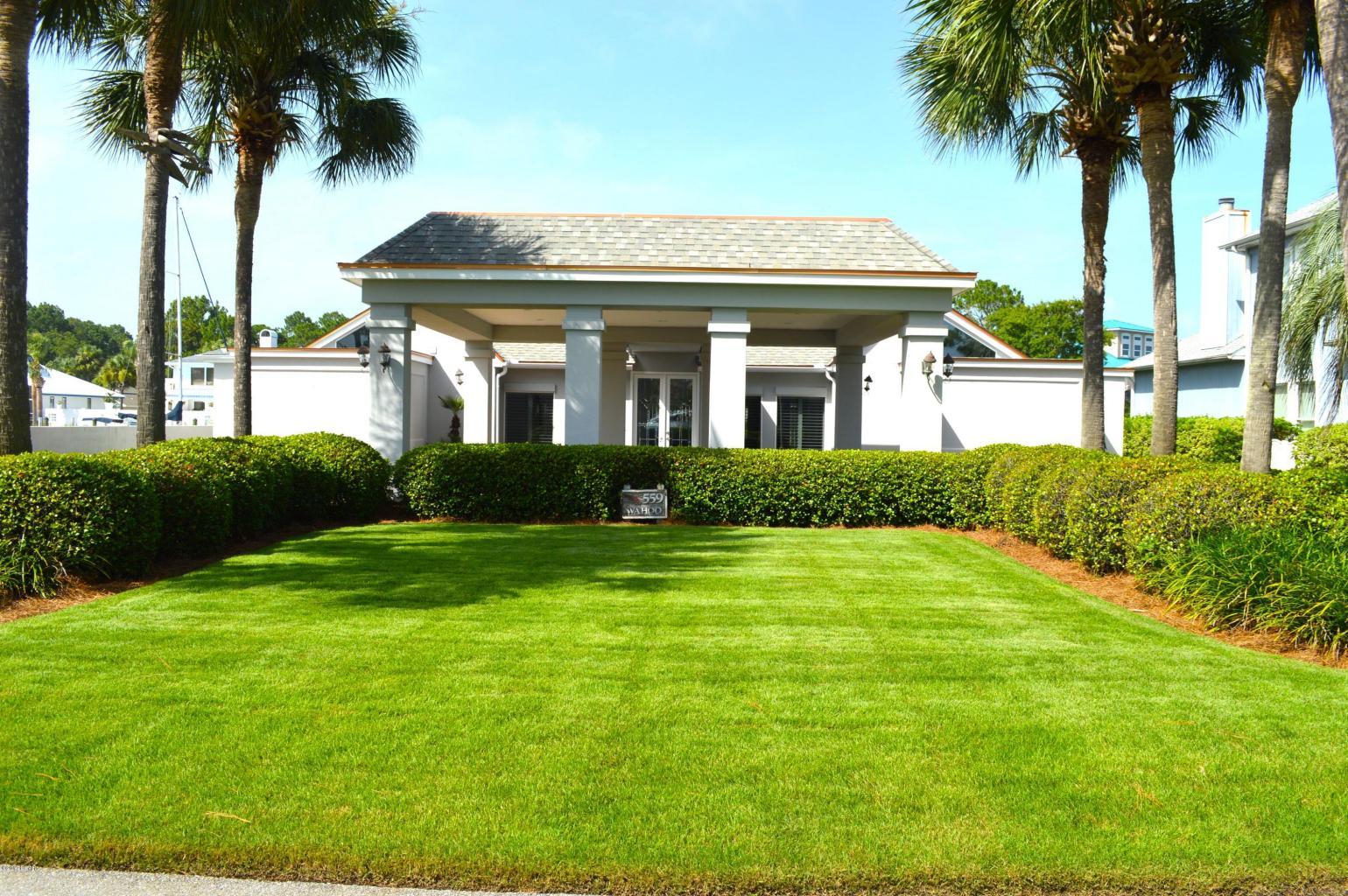East of the bridge in Bay Point! You can be fishing in the Gulf in only minutes! This Panama City Beach home is on 80 feet of deep water for your yacht or sailboat, or any boat! Enjoy views of the canal from your screened in porch and views of Grand Lagoon from your front yard. This 3 bedroom, 2 bath home has an open layout and you feel welcome as soon as you walk in the door. This home features a fireplace, and views from almost every room. Enjoy your master bedroom on the water, including an extra space for office or sitting room, and spacious master bath. This split bedroom plan has the other 2 bedrooms on the opposite side of the home, including 1 bedroom with a water view, and extra space that can be an office, sitting room, or exercise room. If you are looking to live on the More...