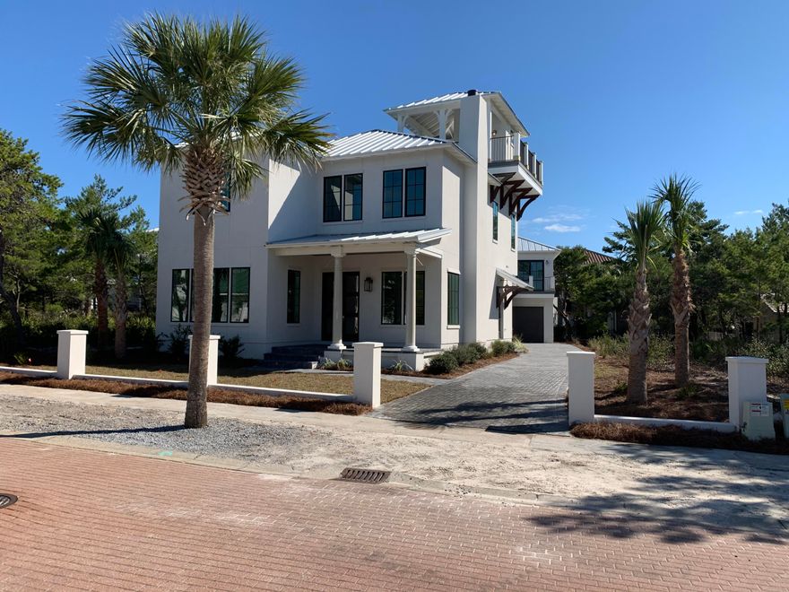 Beautiful NEW CONSTRUCTION in the quaint, sought-after 30A (beachside) gated subdivision of The Village of White Cliffs. Home features 5 bedrooms (master on 1st floor), each with private baths & plentiful closet storage. Enjoy gatherings with this functional, open floor plan boasting 2 generous living areas, chef's kitchen, gracious dining space, powder room, laundry room, relaxing exterior porches & outdoor kitchen. Delightful third floor porch offers lovely views and a glimpse of the Gulf. Guest carriage house with full bath, kitchenette, and 1-car garage. Quality craftsmanship & thoughtfully chosen designer finishings throughout: wood accent walls, 12' vaulted wood ceilings, custom cypress barn doors, quartz countertops, professional-grade stainless appliances, gas fireplace, and more. Gated community features a fabulous, private beach access with bathroom and exterior rinsing shower, making beach time a breeze! Other neighborhood amenities include a seasonally heated pool, tennis court, and clubhouse with fitness room, kitchen, gathering space, entertainment/game room, and library. You will love the privacy, beach convenience, and amenities that this peaceful beachside community offers it's residents! Don't miss a prime opportunity to own this extraordinary new home in The Village of White Cliffs! **More photos to be added
