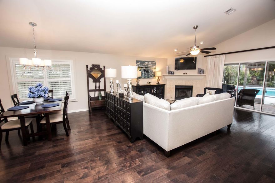 If you are looking for the perfect family neighborhood in Destin, Indian lake is where you want to be. This neighborhood is centrally located and offers ease of access where ever you need to go.Situated on a quiet Cul de sac, 4045 Broken arrow court is unique in that it has one of the largest lots in the neighborhood.While unassuming from the front, when you open the front door you will immediately appreciate the beautiful open floor plan, updated flooring, plantation shutters and all the updates throughout the home. The Kitchen offers plenty of Storage, new appliances and a gas stove.The open floor plan makes this home perfect for entertaining. Open the double sliding doors to the screened in porch and enjoy the view.Extensive landscaping must be seen to be appreciated,