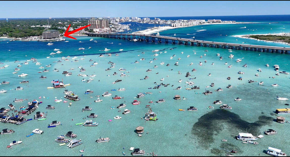 Welcome to your slice of Paradise where every glance unveils panoramic vistas of the Gulf, the bay, the harbor, the Jettys and iconic Crab Island. You can have your million-dollar views for under a million. Enjoy a cup of coffee or a glass of wine on your 1000 sq ft wrap around balcony as you watch the dolphins play also watching the most magnificent sunsets/sunrises and fireworks. This unique and spacious 3-bedroom, 3 full bath, 2142 sq ft. waterfront condo sits at the best location in Destin with everything is in reach. Built in 2004 and located at 5 Callhoun Ave unit 208 in Destin, FL. Every bedroom has its own door that opens onto the balcony. The floor the ceiling glass windows have a 140 MPH impact rating. Enjoy the large, updated kitchen overlooking the beautiful views. This well-maintained home is perfect for those seeking a comfortable and convenient living space in a desirable location. Don't miss out on this opportunity to make this property with pool/gazebo your own!