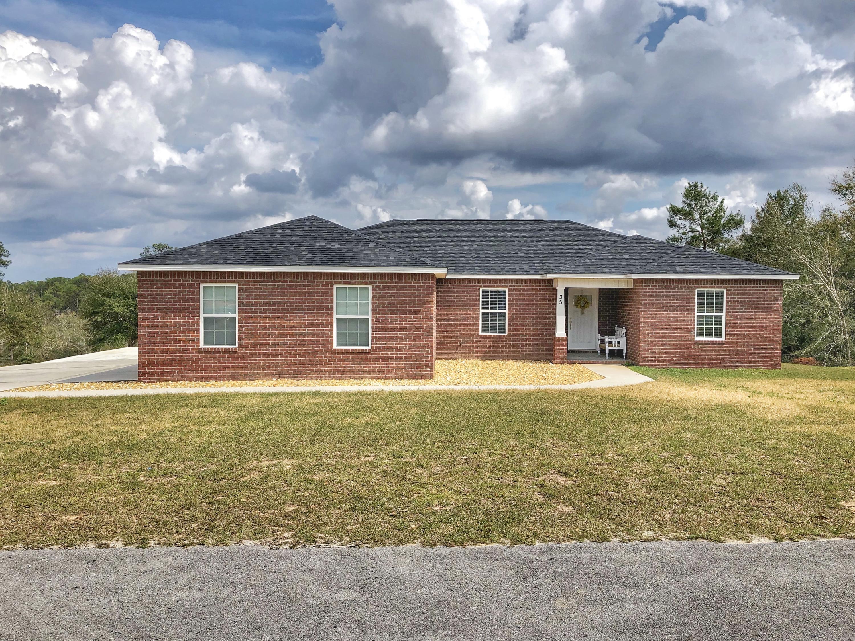 LIKE NEW! 4 bedroom 2 bathroom brick house in beautiful Hidden Lakes Estates. Only been lived in a little over a year. Open floor concept with a split bedroom floor plan. This home features laminate flooring in the living room, dining area and kitchen. Stained upgraded soft close cabinets in kitchen and bathrooms. And a big backyard for entertaining. This house is a must see! SCHEDULE YOUR SHOWING TODAY!!!